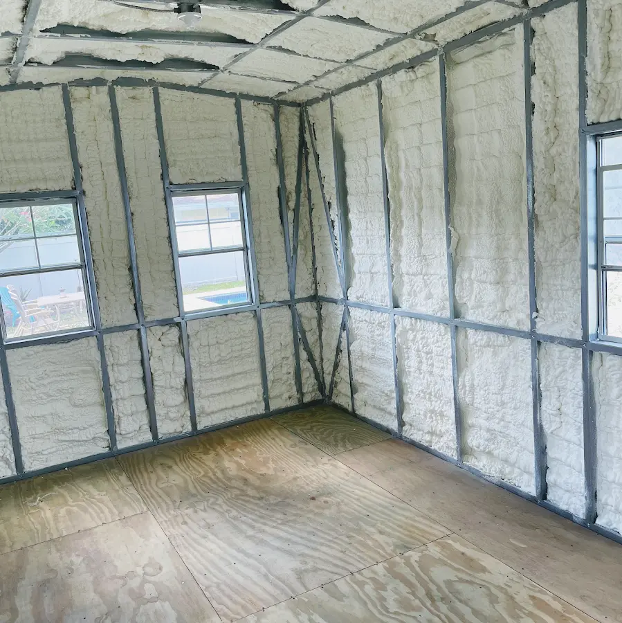 Closed-cell spray foam insulation applied to wall cavities in a residential project in Hopewell